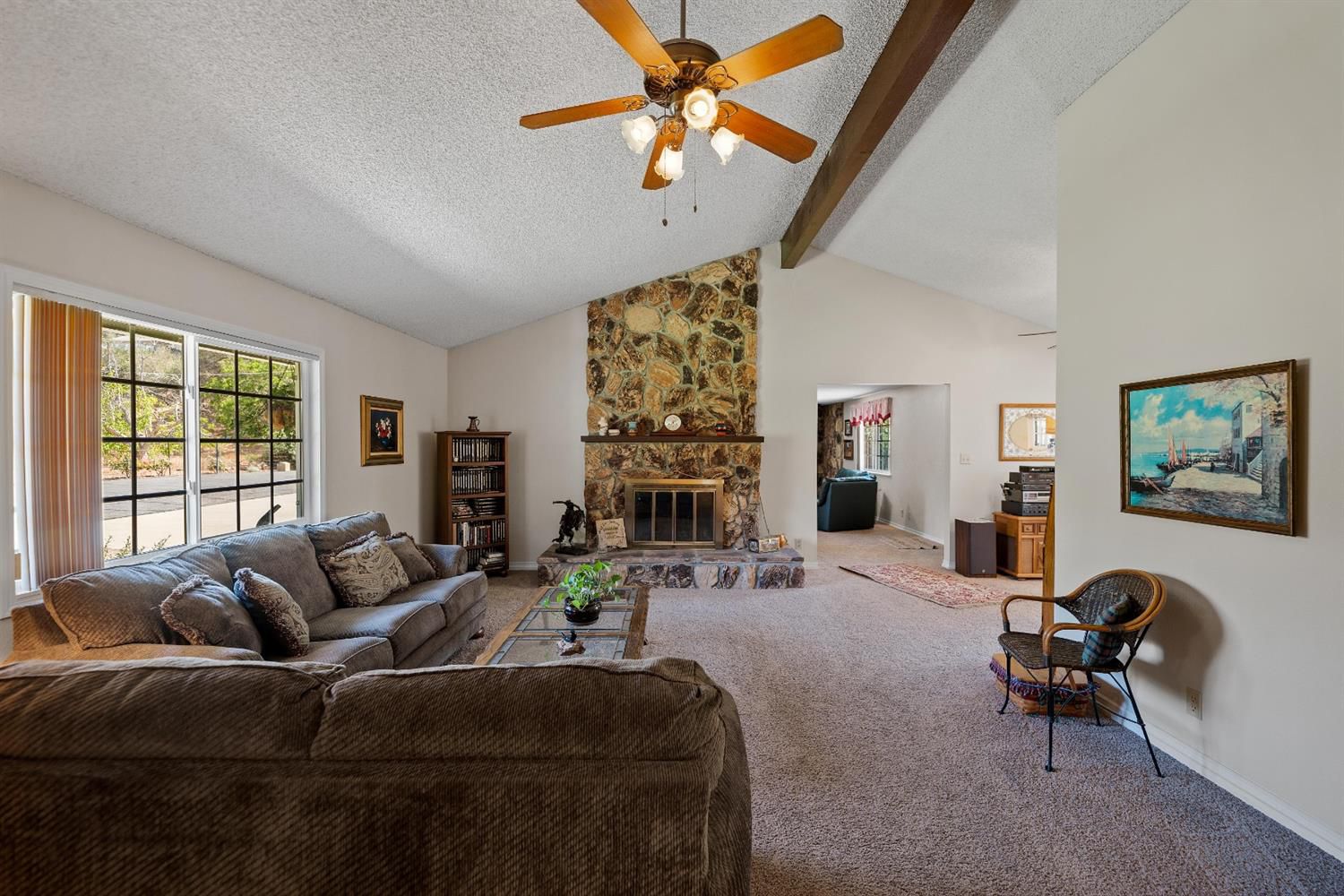 488 South Rice Road Ojai, CA 93023 - Photo 5 of 23 a living room with furniture fireplace and a large window