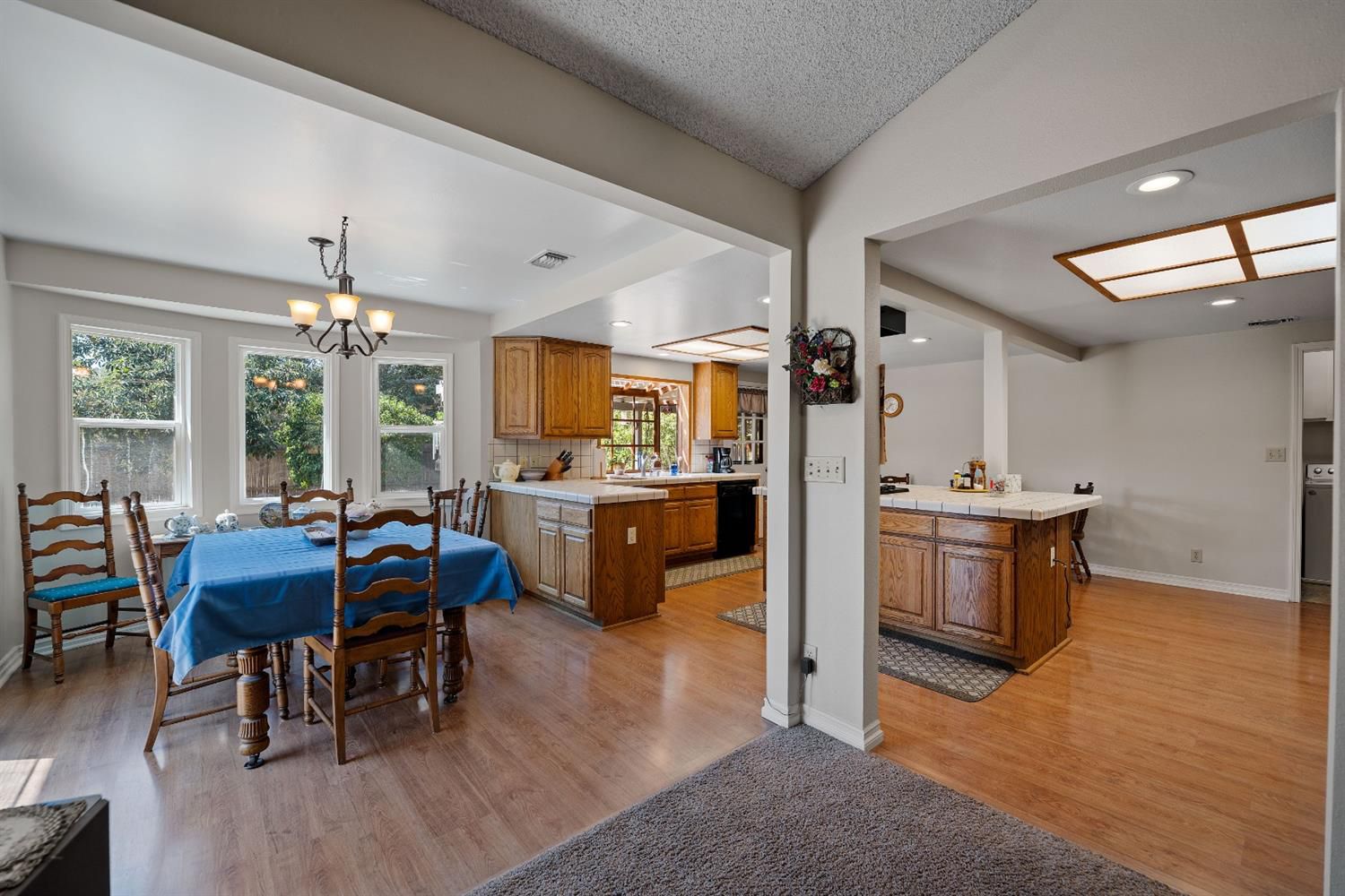 488 South Rice Road Ojai, CA 93023 - Photo 9 of 23 a large kitchen with a table and chairs