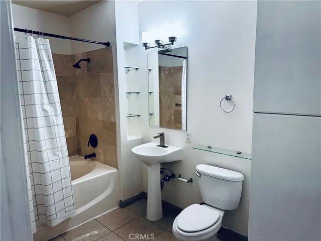 a view of a swimming pool with a lounge chairs