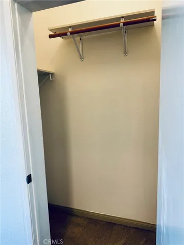 a kitchen with stainless steel appliances a refrigerator and cabinets