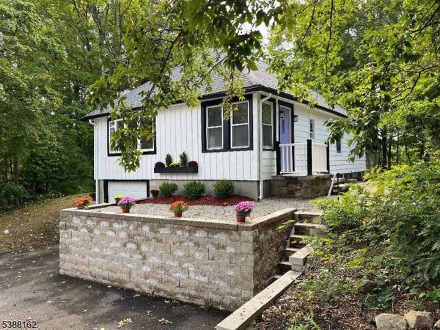 a front view of a house with porch
