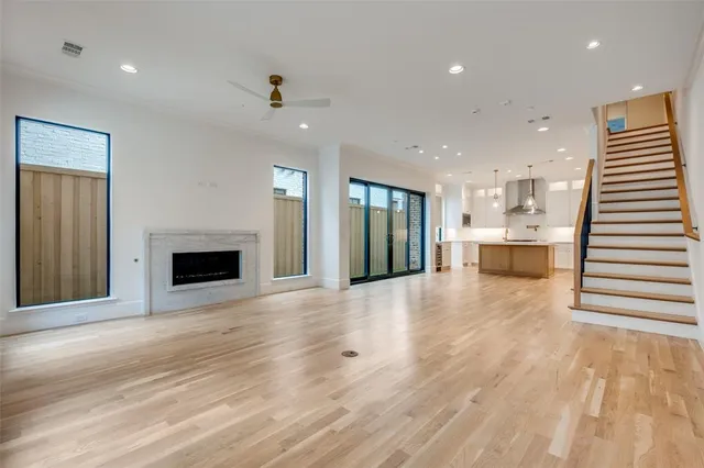 a view of a kitchen with furniture and a fireplace