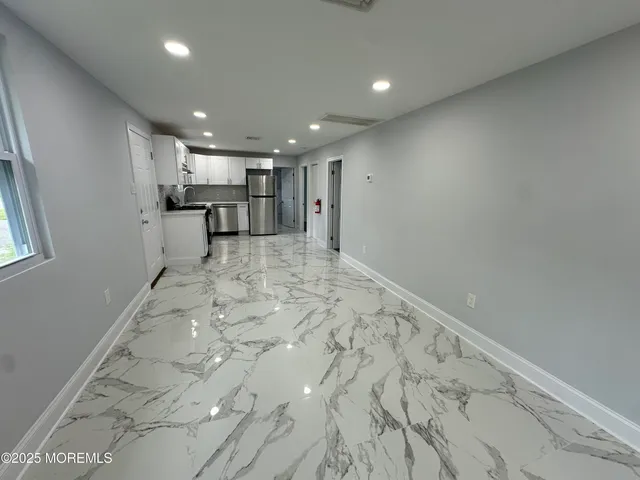 a view of livingroom with furniture