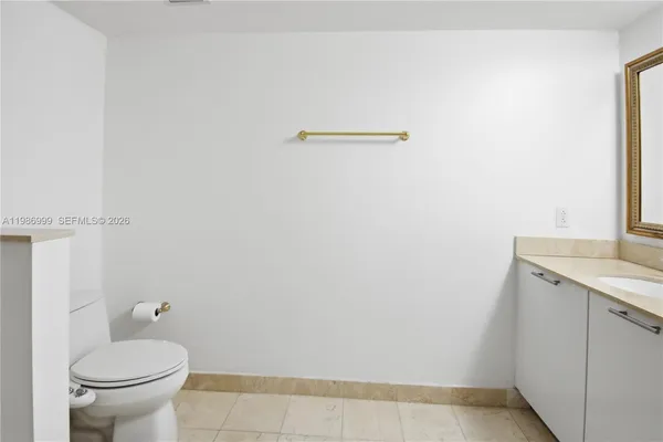 a bathroom with a sink and a toilet