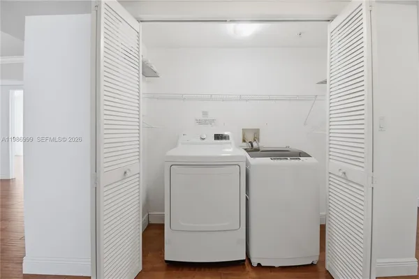 a utility room with dryer and washer