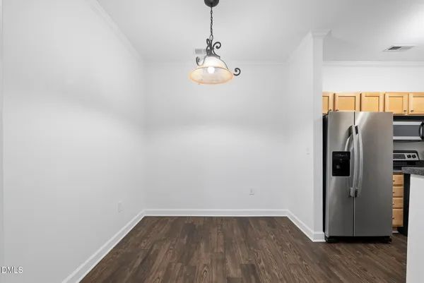a view of a kitchen with a sink