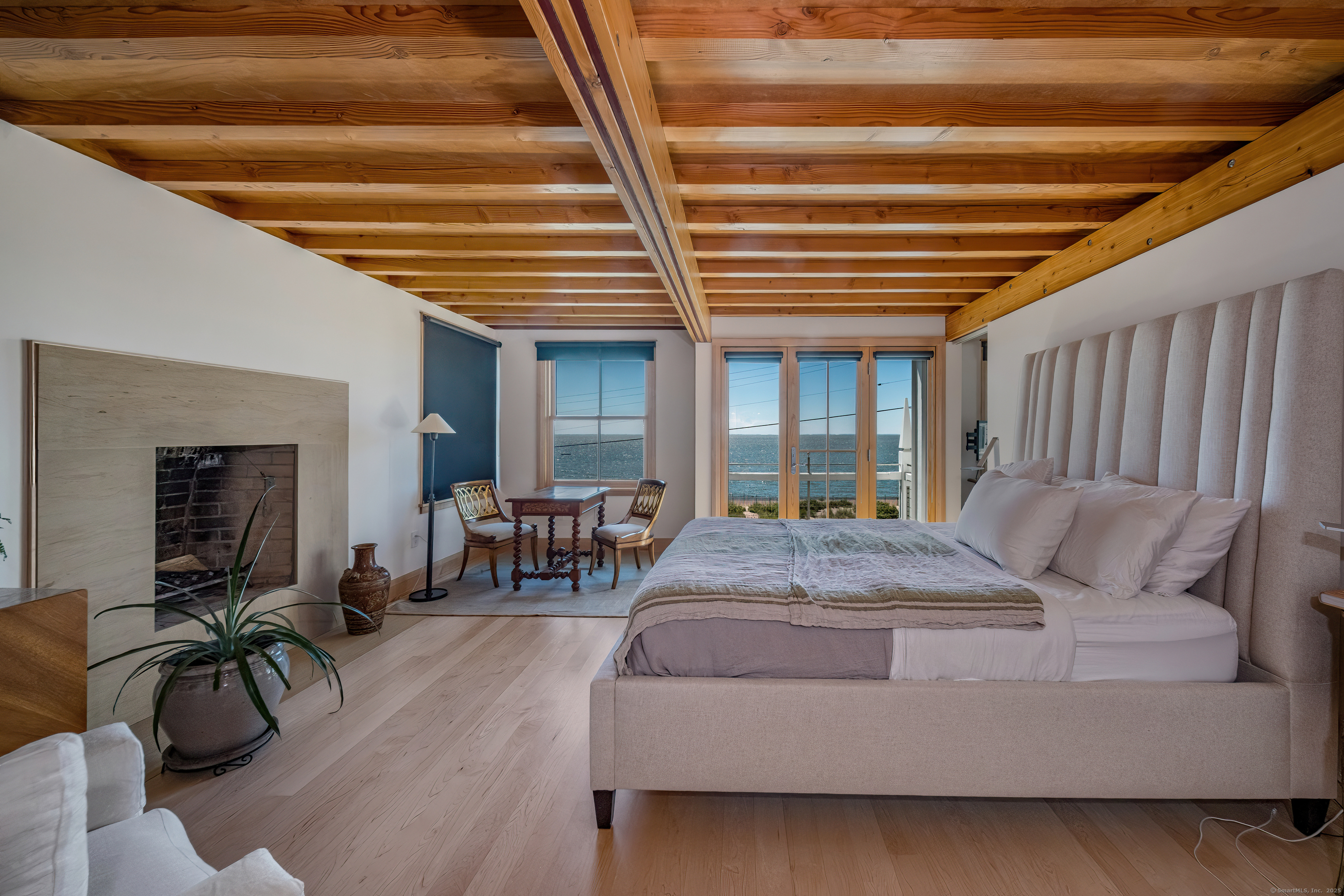 33 Seaview Avenue Madison, CT 06443 - Photo 21 of 40 a living room with furniture and wooden floor