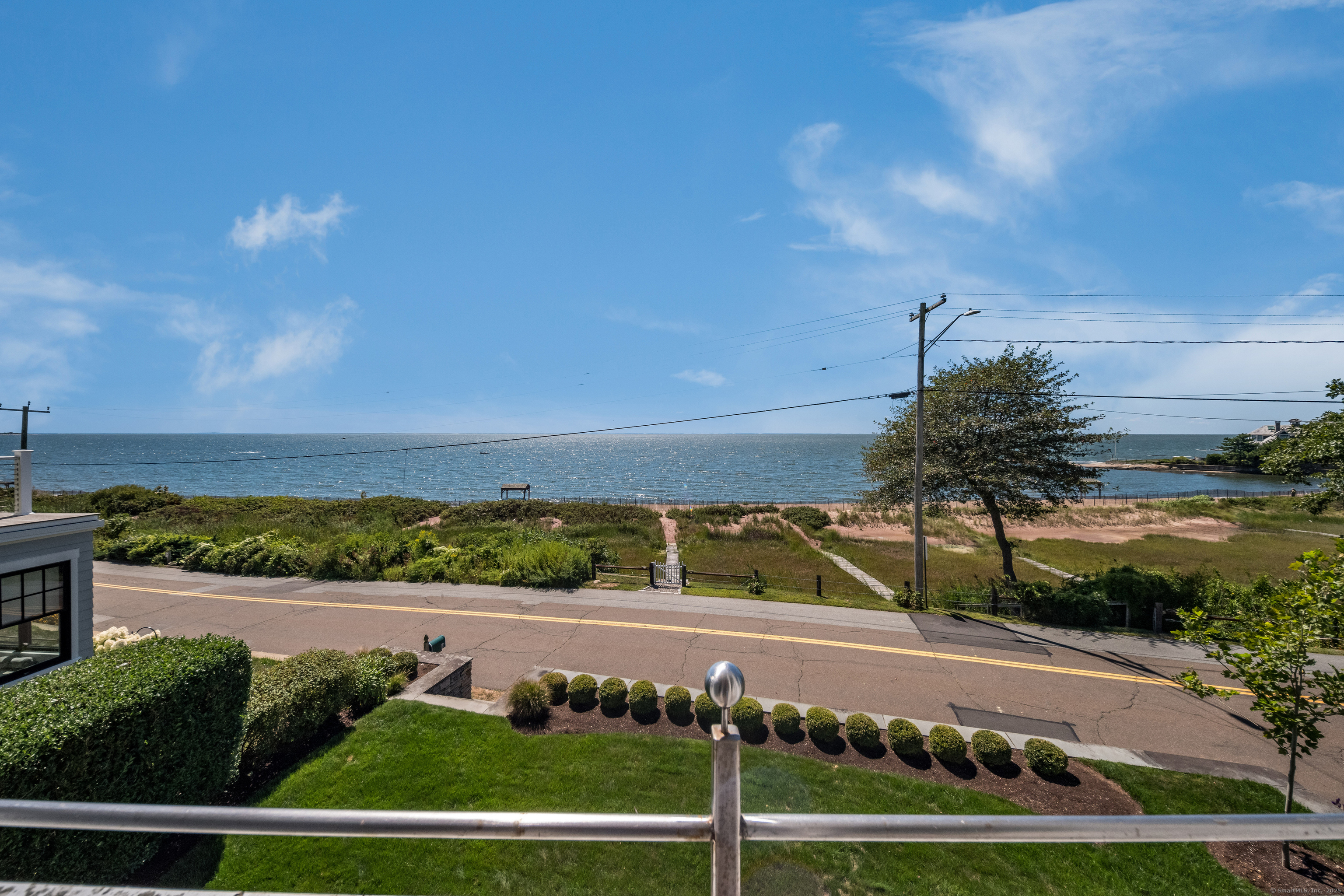 33 Seaview Avenue Madison, CT 06443 - Photo 22 of 40 a view of a swimming pool with an ocean view