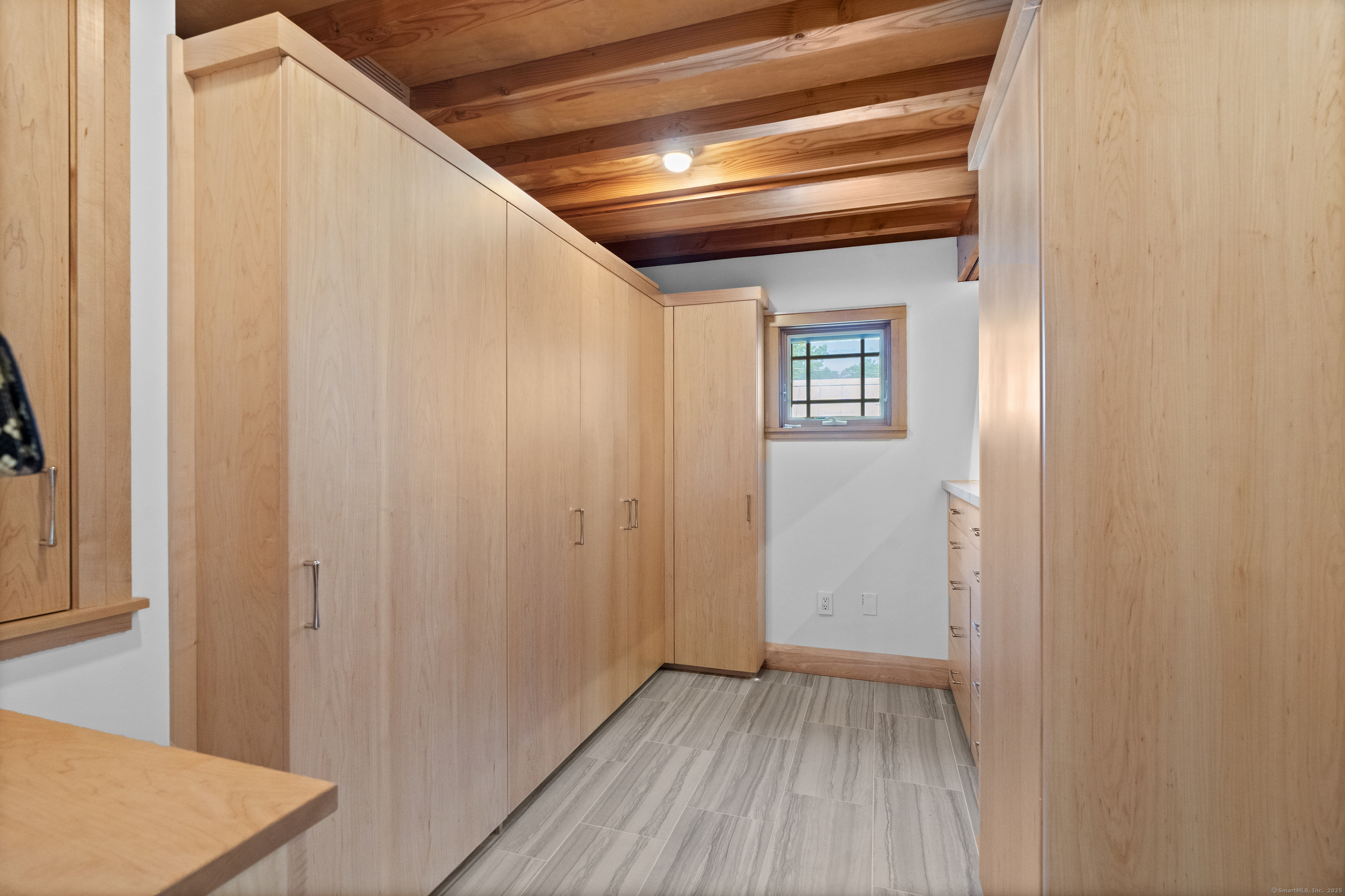 33 Seaview Avenue Madison, CT 06443 - Photo 25 of 40 a view of a hallway with wooden floor