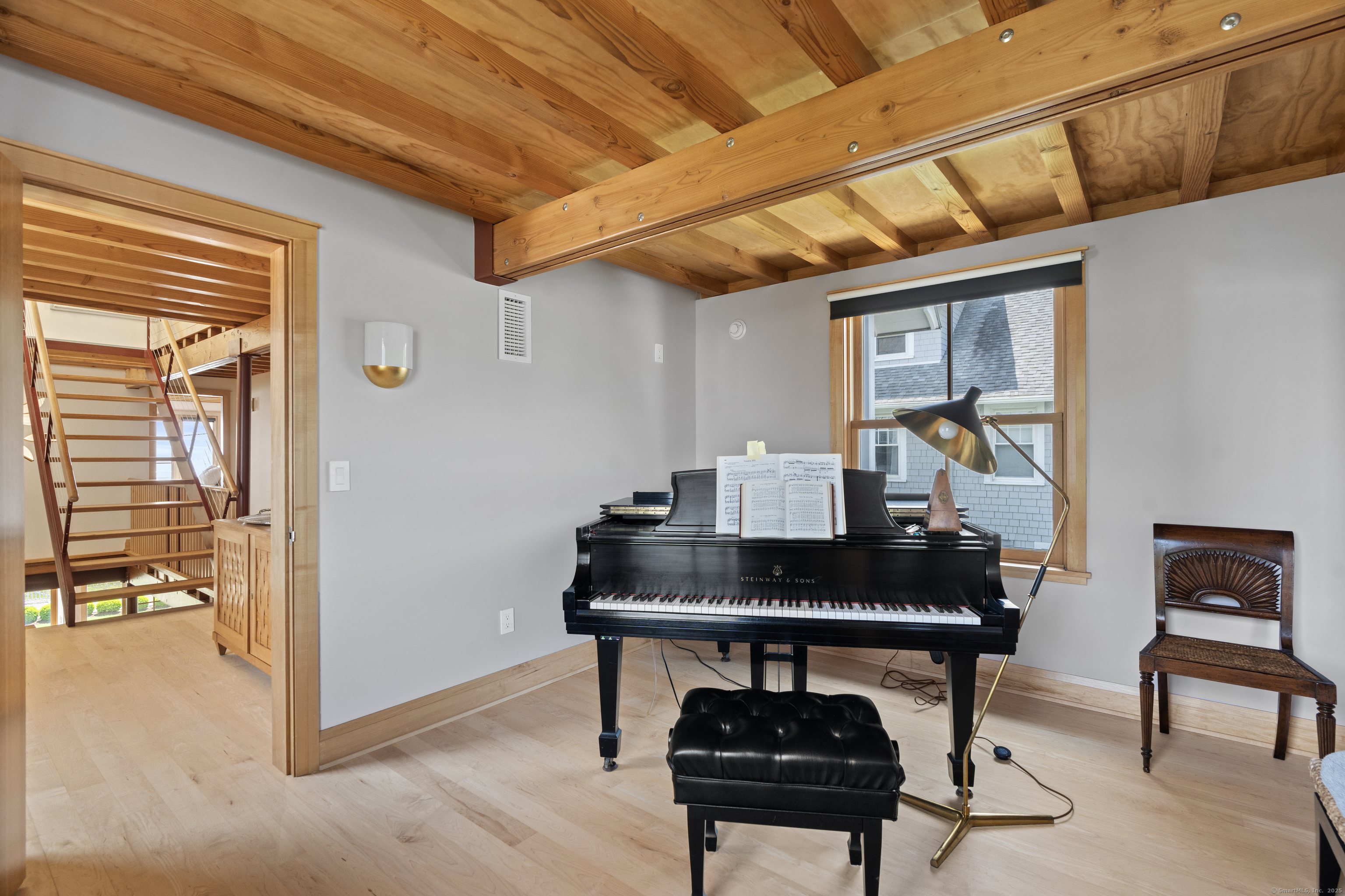 33 Seaview Avenue Madison, CT 06443 - Photo 26 of 40 a living room with furniture a rug and a window