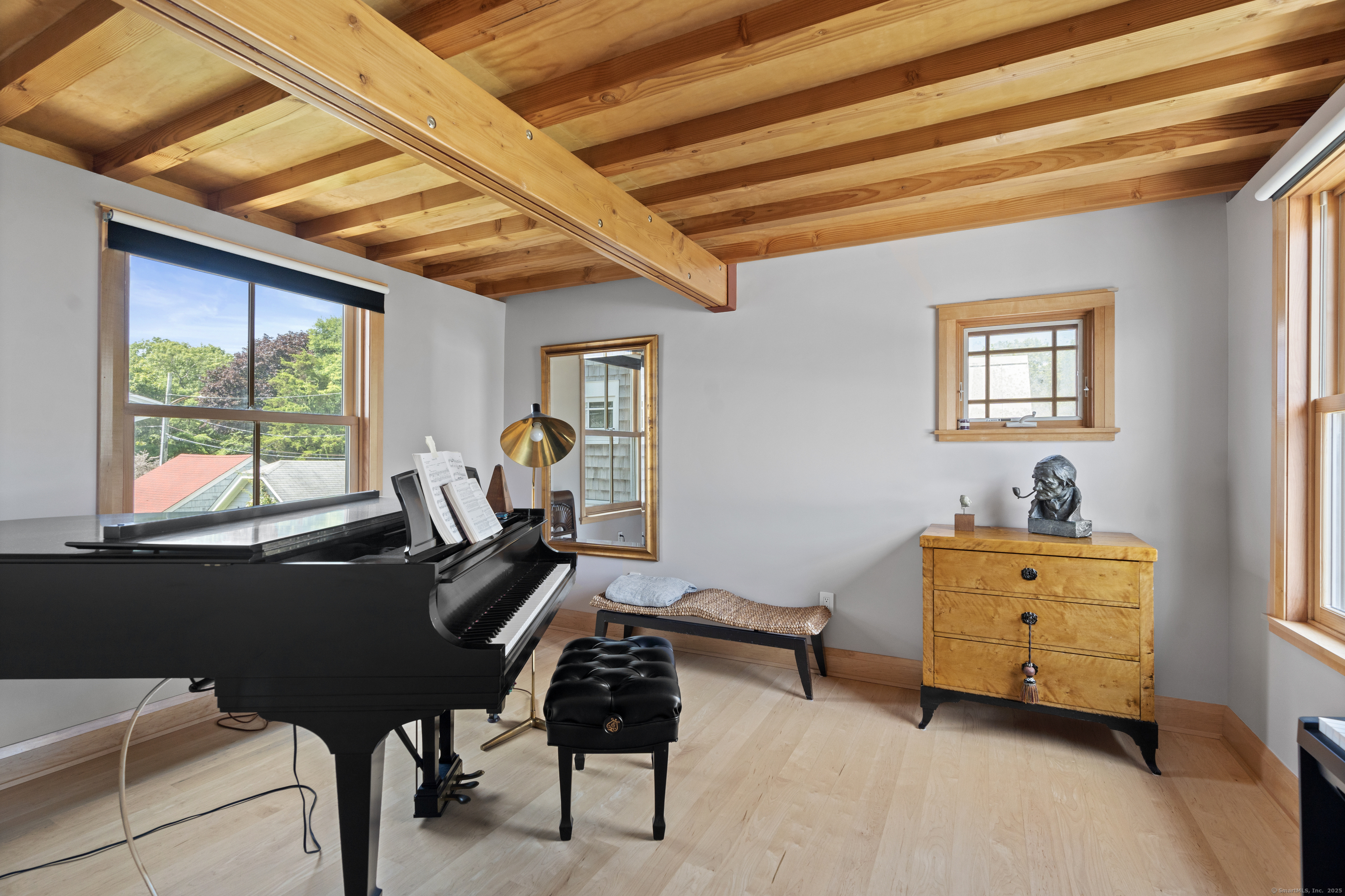 33 Seaview Avenue Madison, CT 06443 - Photo 27 of 40 a room with furniture and a window