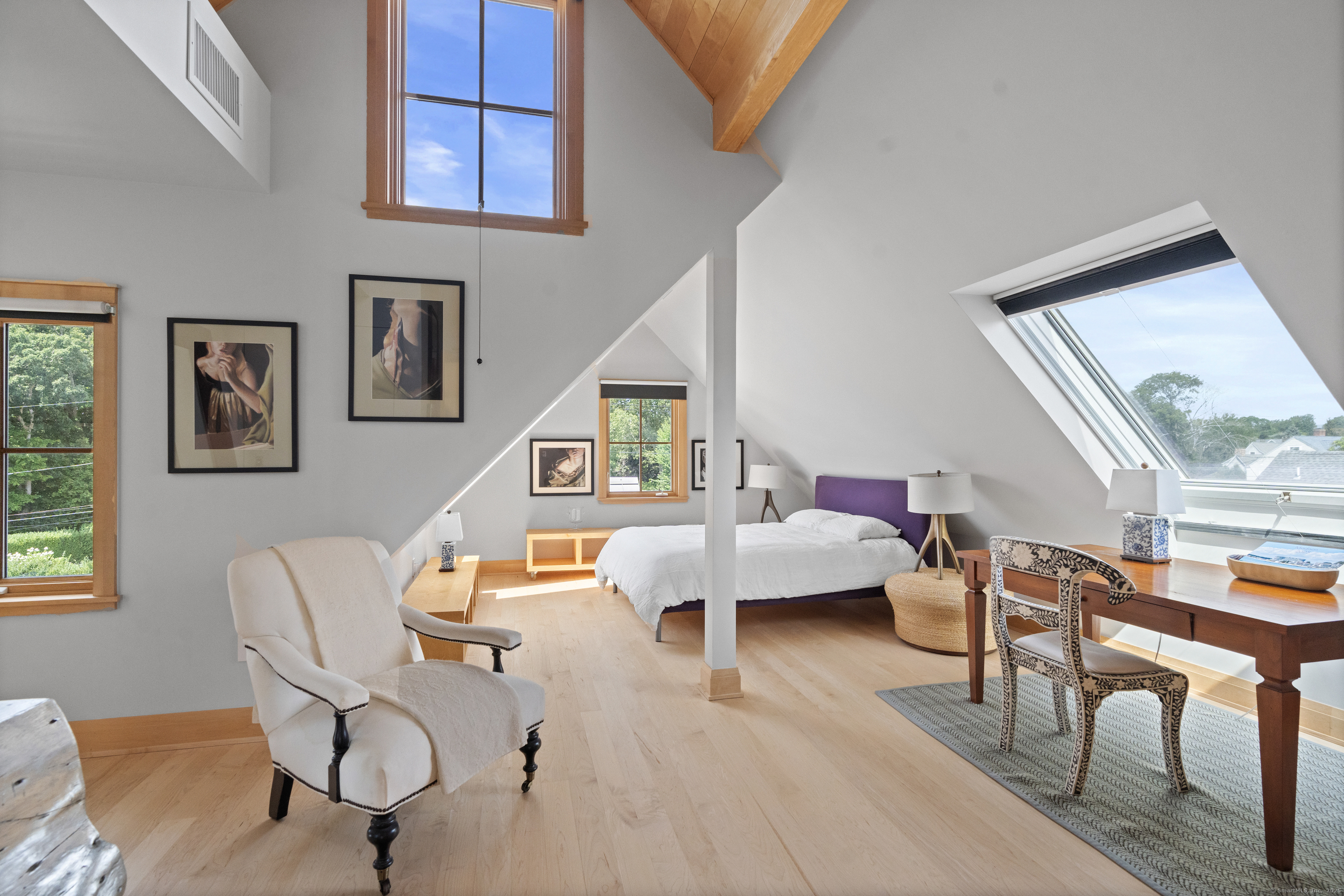 33 Seaview Avenue Madison, CT 06443 - Photo 34 of 40 a living room with furniture and a large window