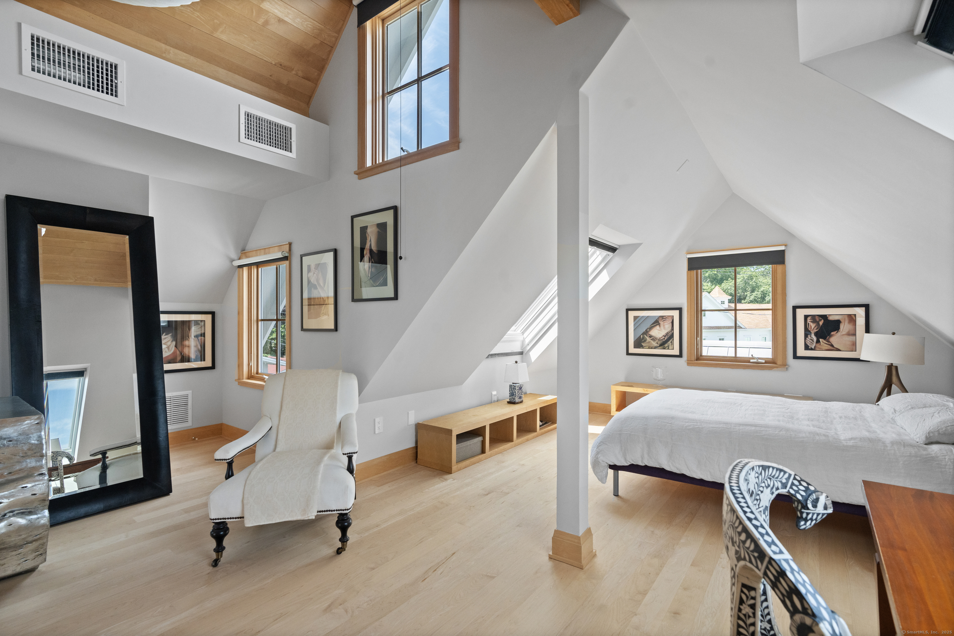 33 Seaview Avenue Madison, CT 06443 - Photo 35 of 40 a bedroom with furniture and a window