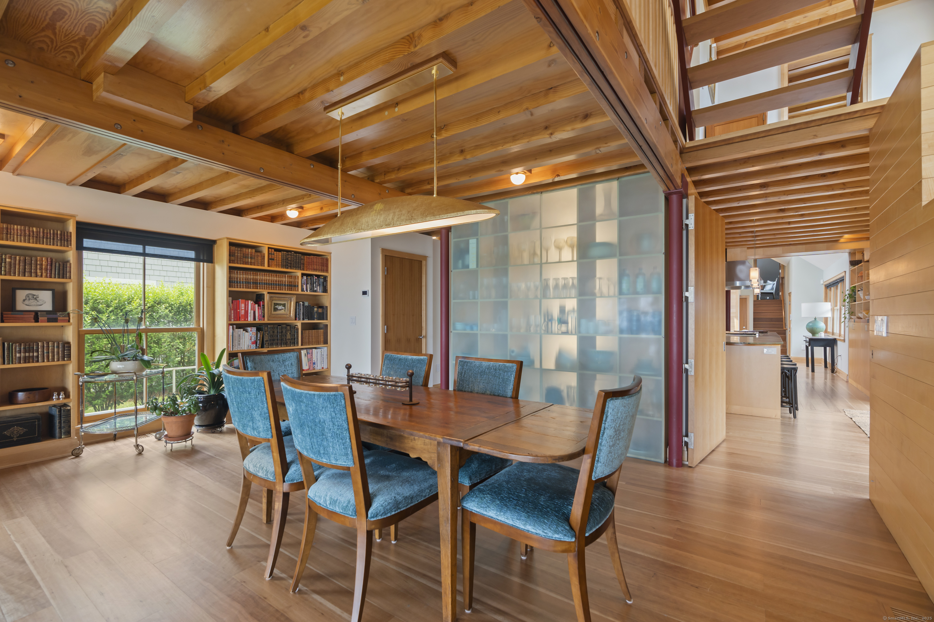 33 Seaview Avenue Madison, CT 06443 - Photo 9 of 40 a dining room with furniture and wooden floor