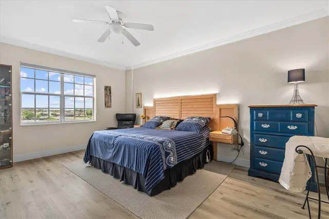 a bedroom with a bed and furniture