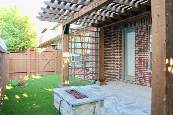 a view of a backyard with a small cabin