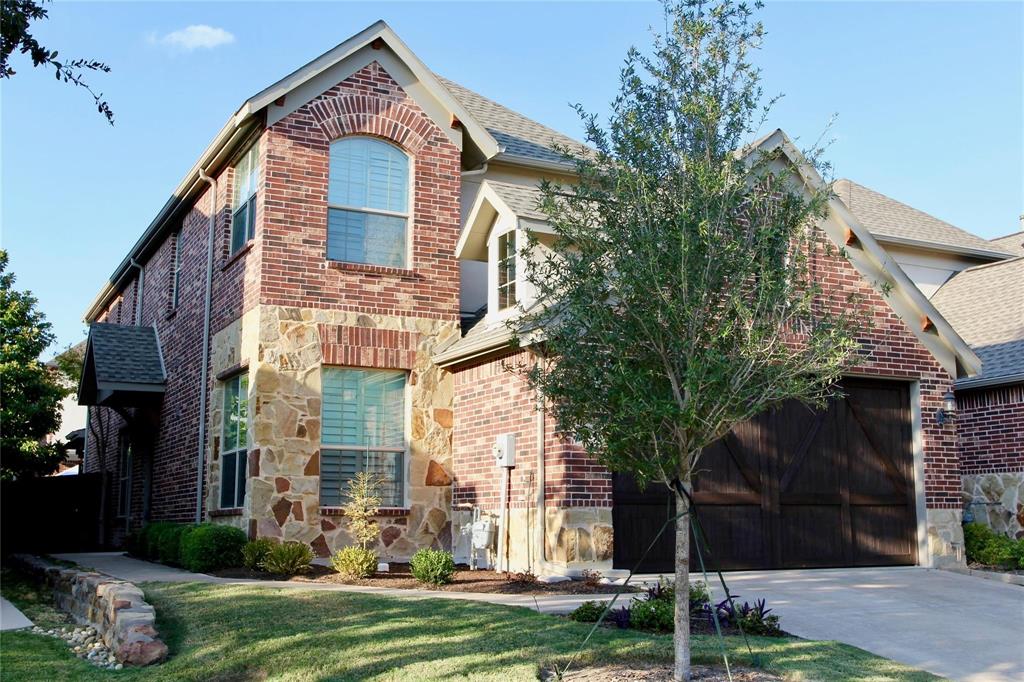 4821 Bayview Drive Plano, TX 75093 - Photo 2 of 21 a front view of a house with a yard