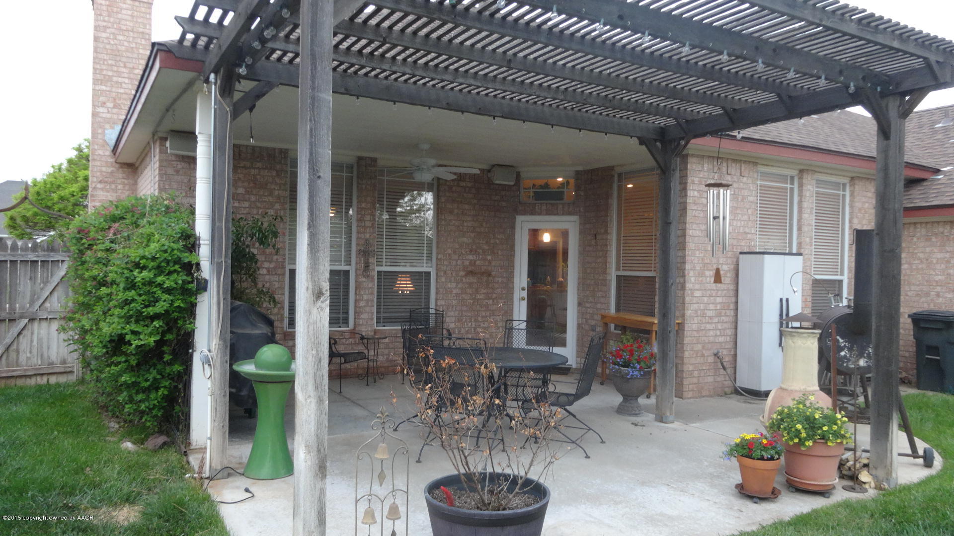 8111 Sheldon Road Amarillo, TX 79119 - Photo 18 of 38 Patio with Extended Pergola