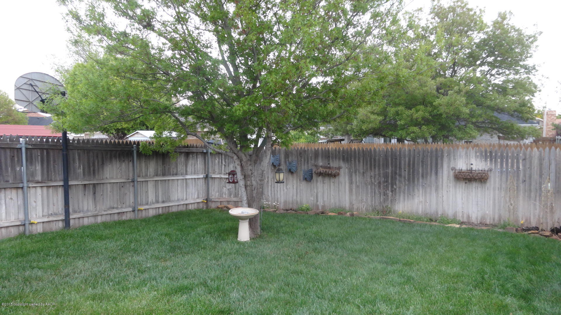 8111 Sheldon Road Amarillo, TX 79119 - Photo 21 of 38 Wood Fenced Yard
