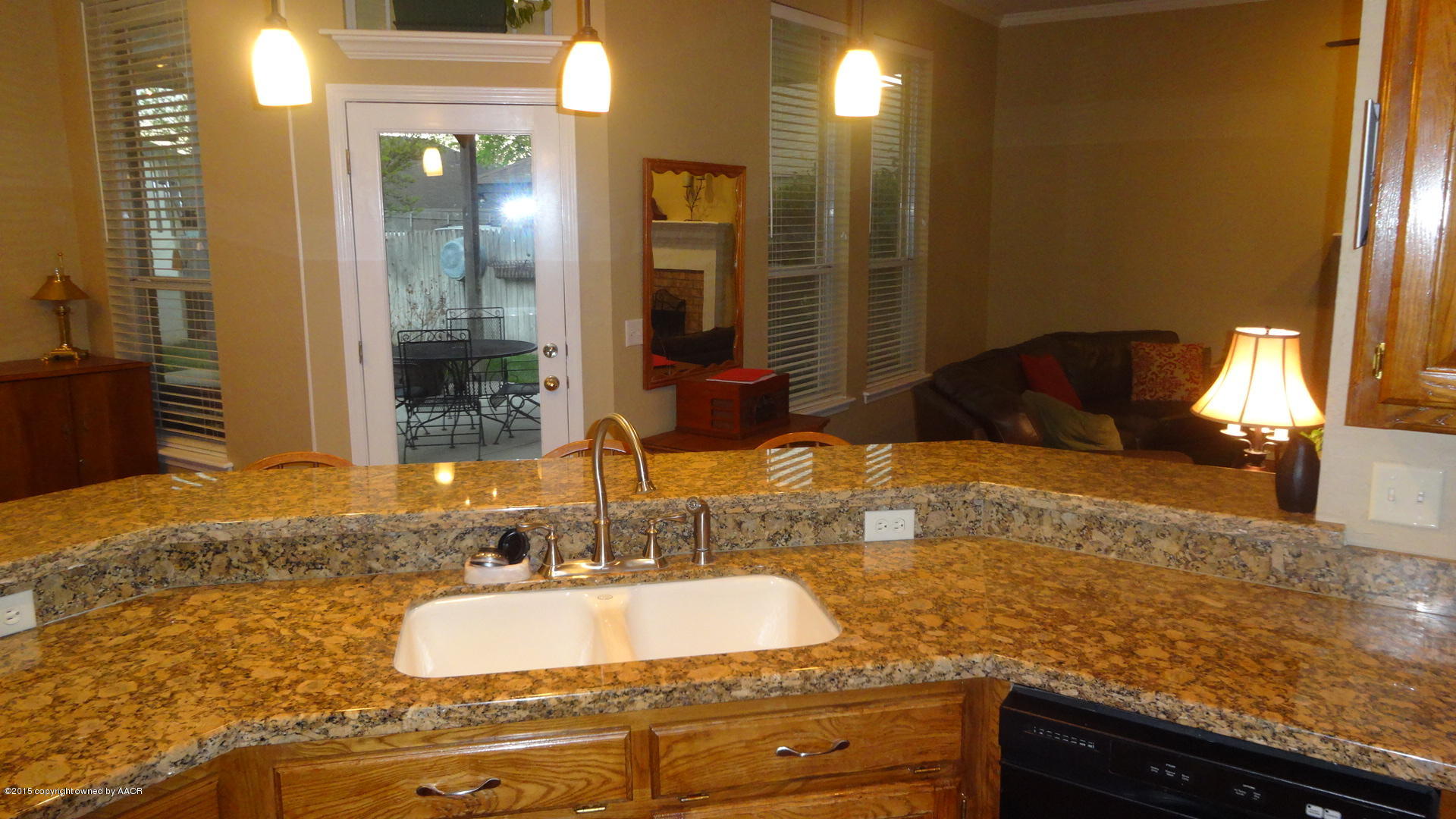 8111 Sheldon Road Amarillo, TX 79119 - Photo 4 of 38 Kitchen Opens onto Patio