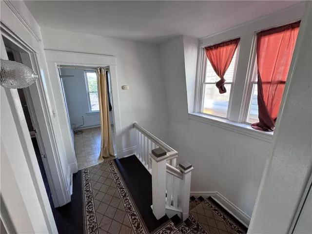 a view of an entryway with sitting area