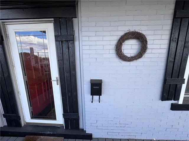 a front view of a house with entryway