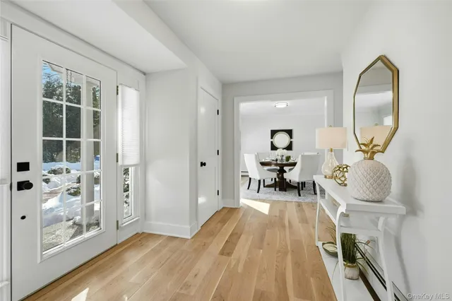 a view of a living room and a wooden floor