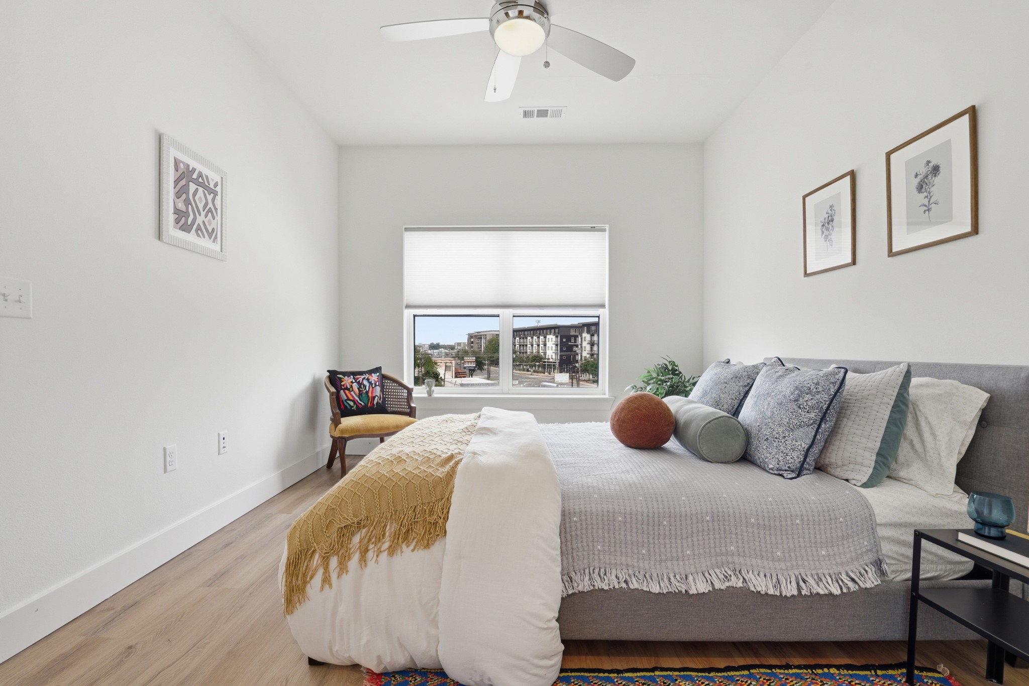 6444 Burnet Road, Unit 403 Austin, TX 78757 - Photo 11 of 29 a bedroom with a bed and window