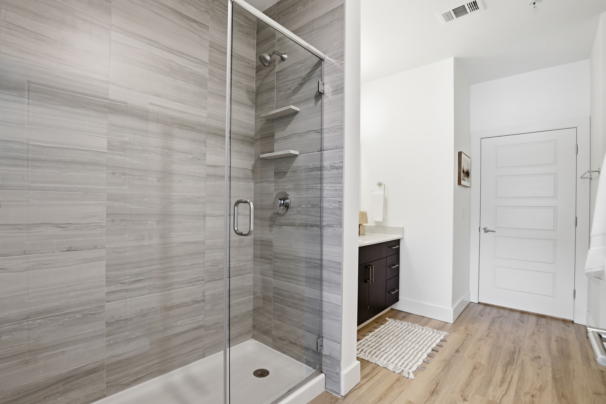 6444 Burnet Road, Unit 403 Austin, TX 78757 - Photo 13 of 29 a bathroom with a shower