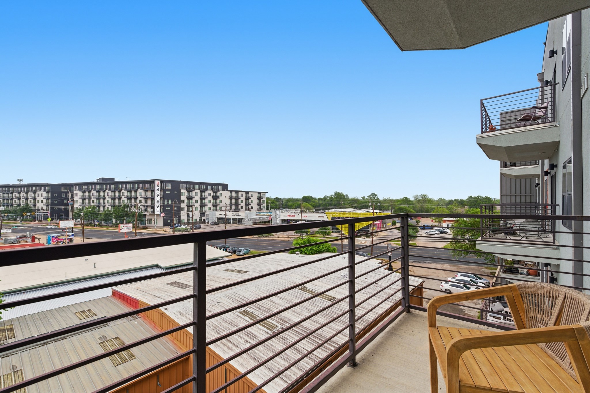 6444 Burnet Road, Unit 403 Austin, TX 78757 - Photo 15 of 29 a view of balcony with furniture