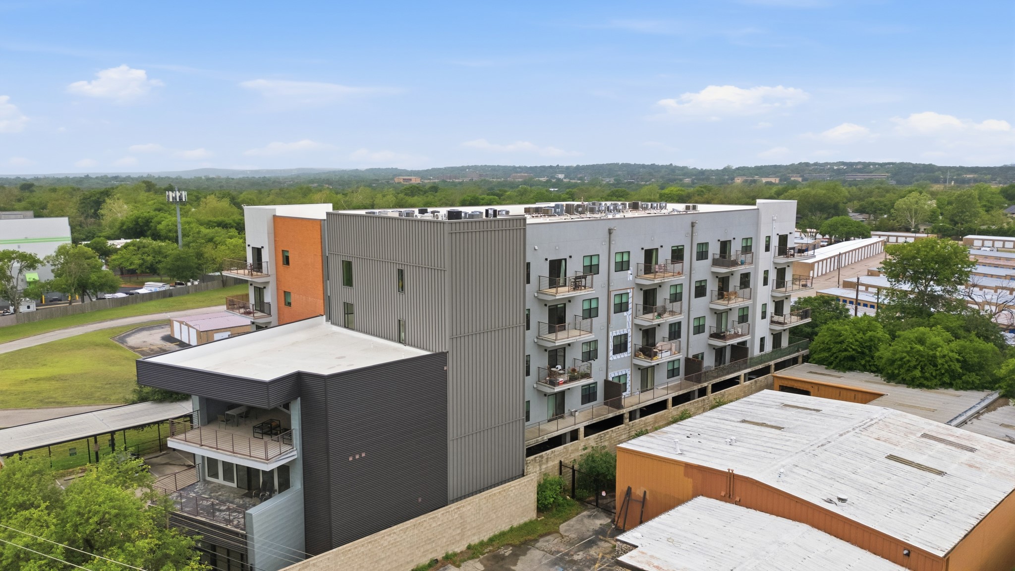6444 Burnet Road, Unit 403 Austin, TX 78757 - Photo 17 of 29 a view of a terrace with a lake view