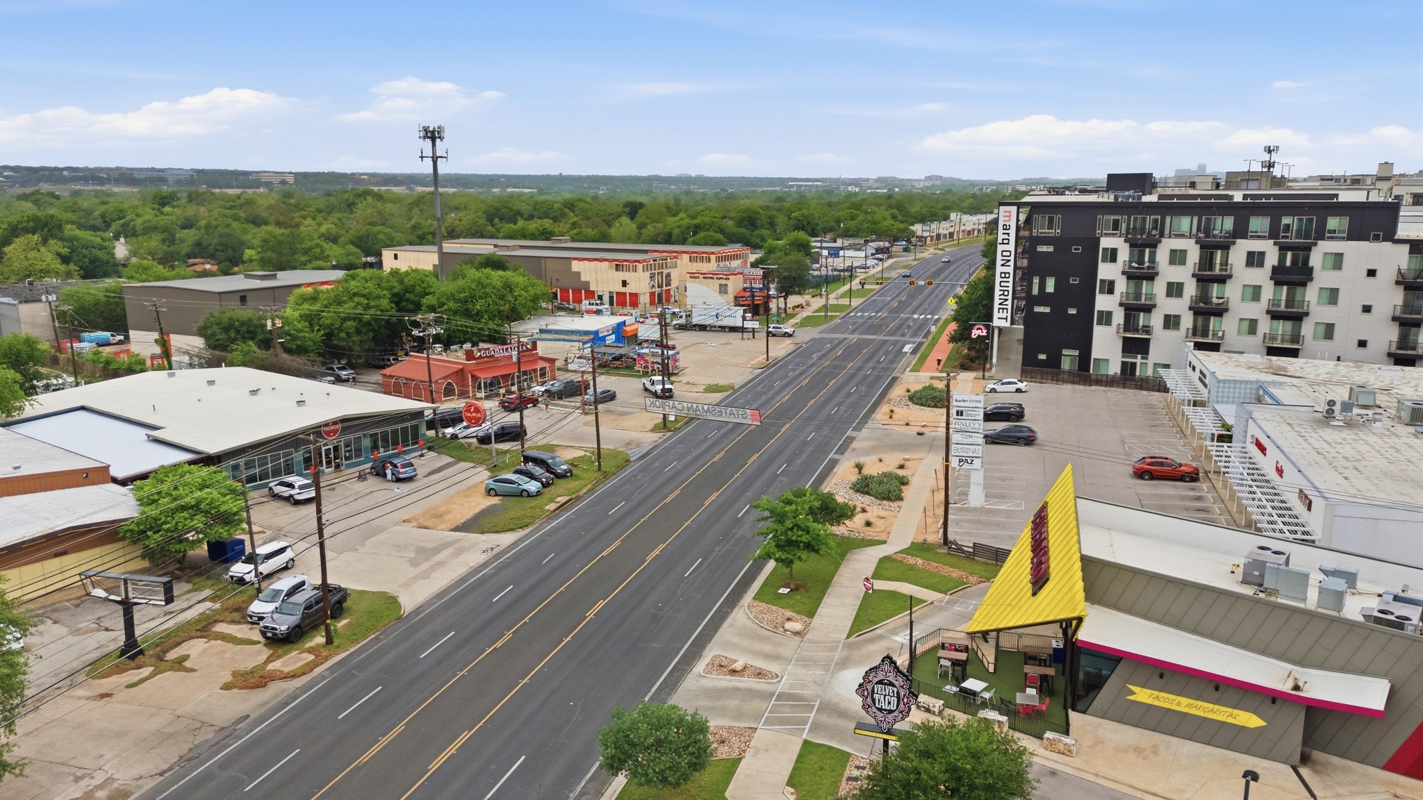 6444 Burnet Road, Unit 403 Austin, TX 78757 - Photo 19 of 29 an aerial view of a house with a terrace view