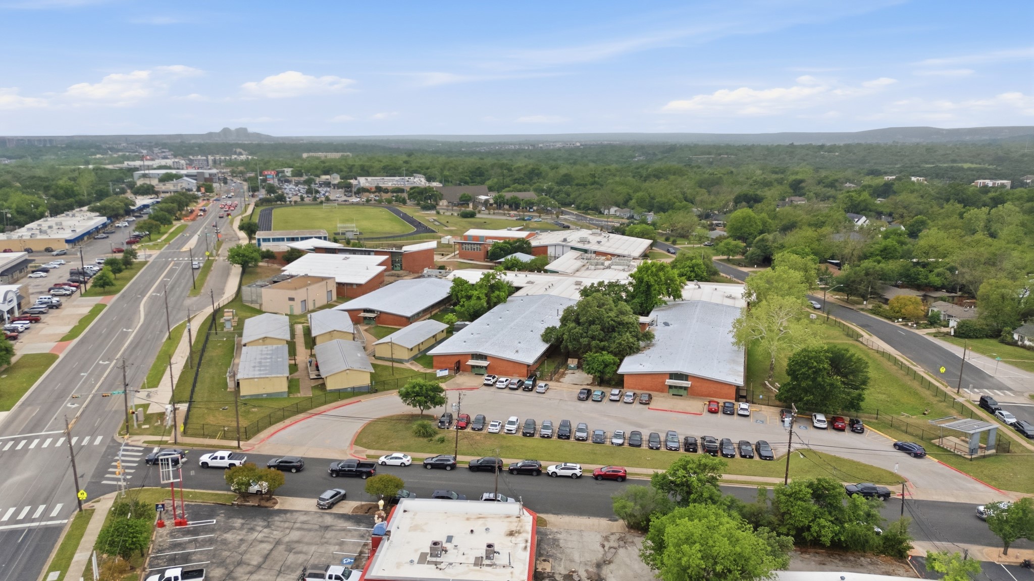 6444 Burnet Road, Unit 403 Austin, TX 78757 - Photo 21 of 29 an aerial view of residential houses with outdoor space