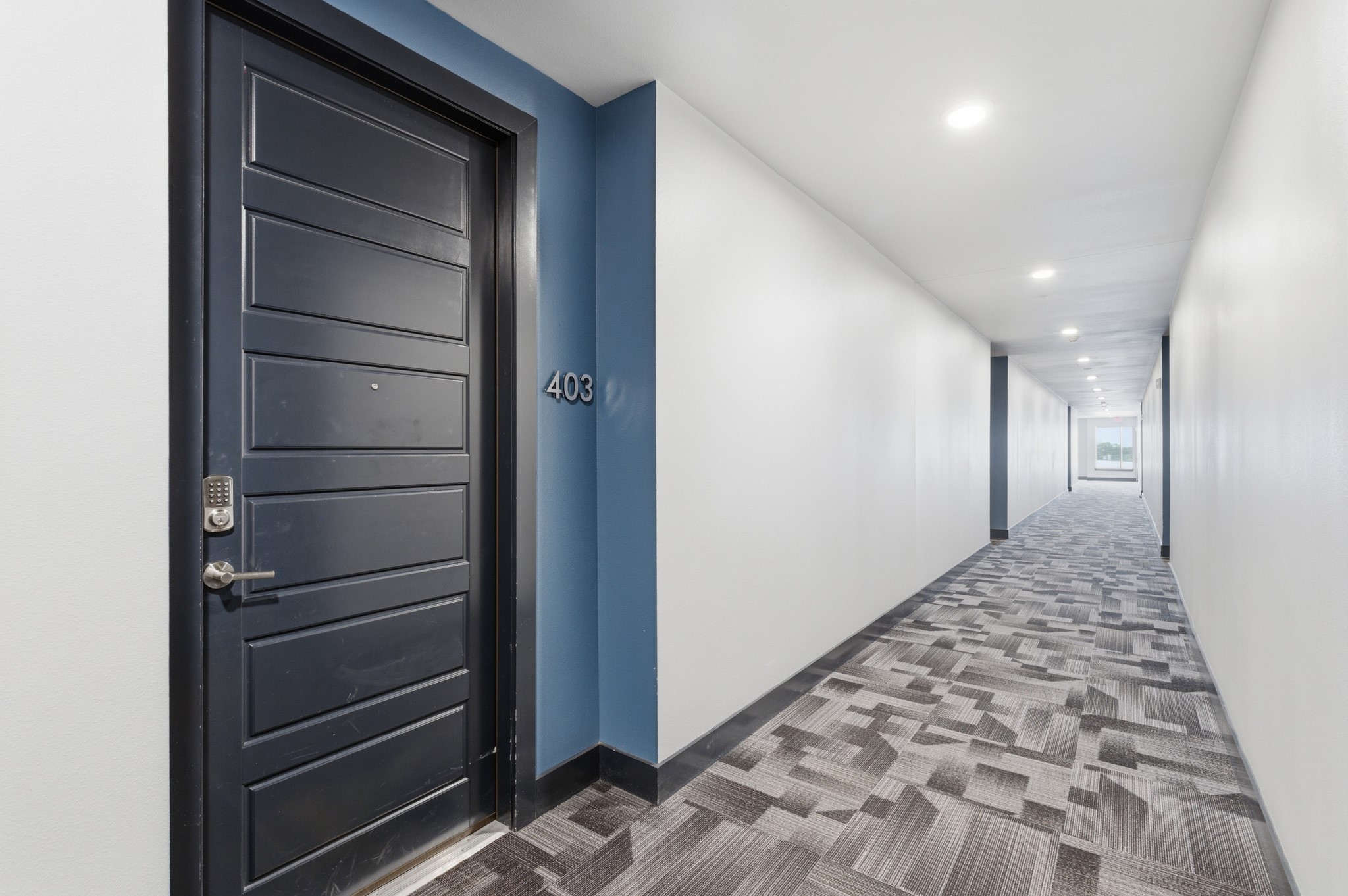 6444 Burnet Road, Unit 403 Austin, TX 78757 - Photo 5 of 29 a view of a hallway