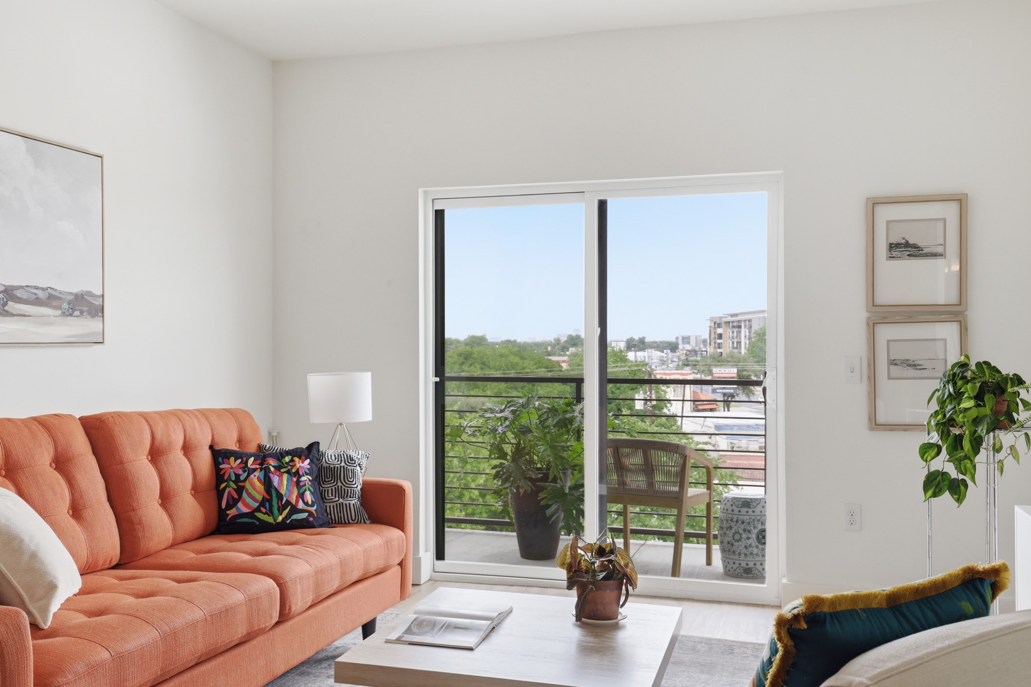 6444 Burnet Road, Unit 403 Austin, TX 78757 - Photo 8 of 29 a living room with furniture and a large window