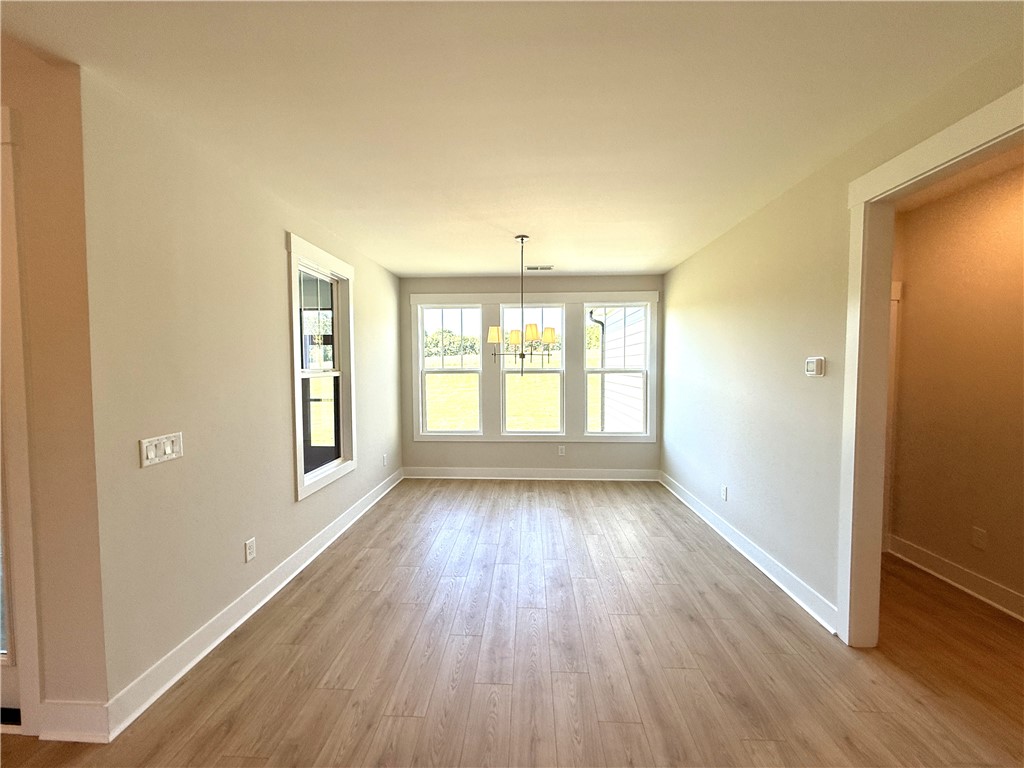 504 Tilman Court Anderson, SC 29621 - Photo 14 of 28 Bright and airy living space featuring elegant flooring and abundant natural light.