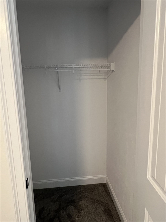 2 Hummingbird Path Watertown, MA 02472 - Photo 21 of 28 a room that has a window in it