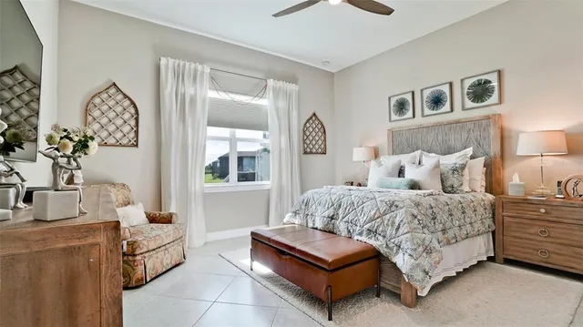 a view of walk in closet with clothes