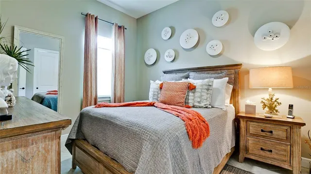 a view of a lake with houses in the back