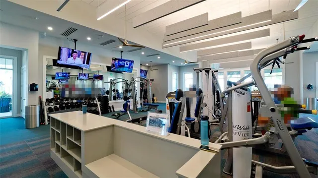 an aerial view of a house a yard swimming pool and outdoor seating