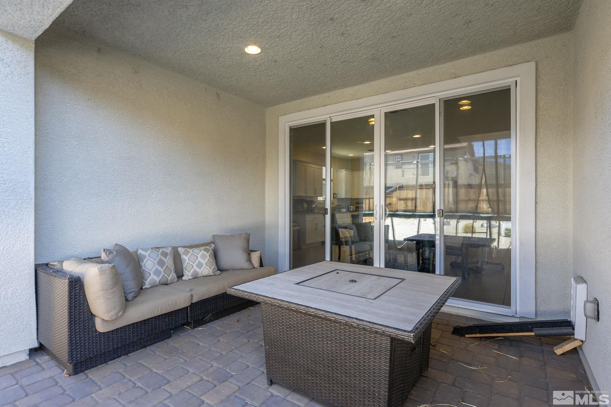 2835 Bonfire Lane Reno, NV 89521 - Photo 25 of 28 a room with pool table and glass door