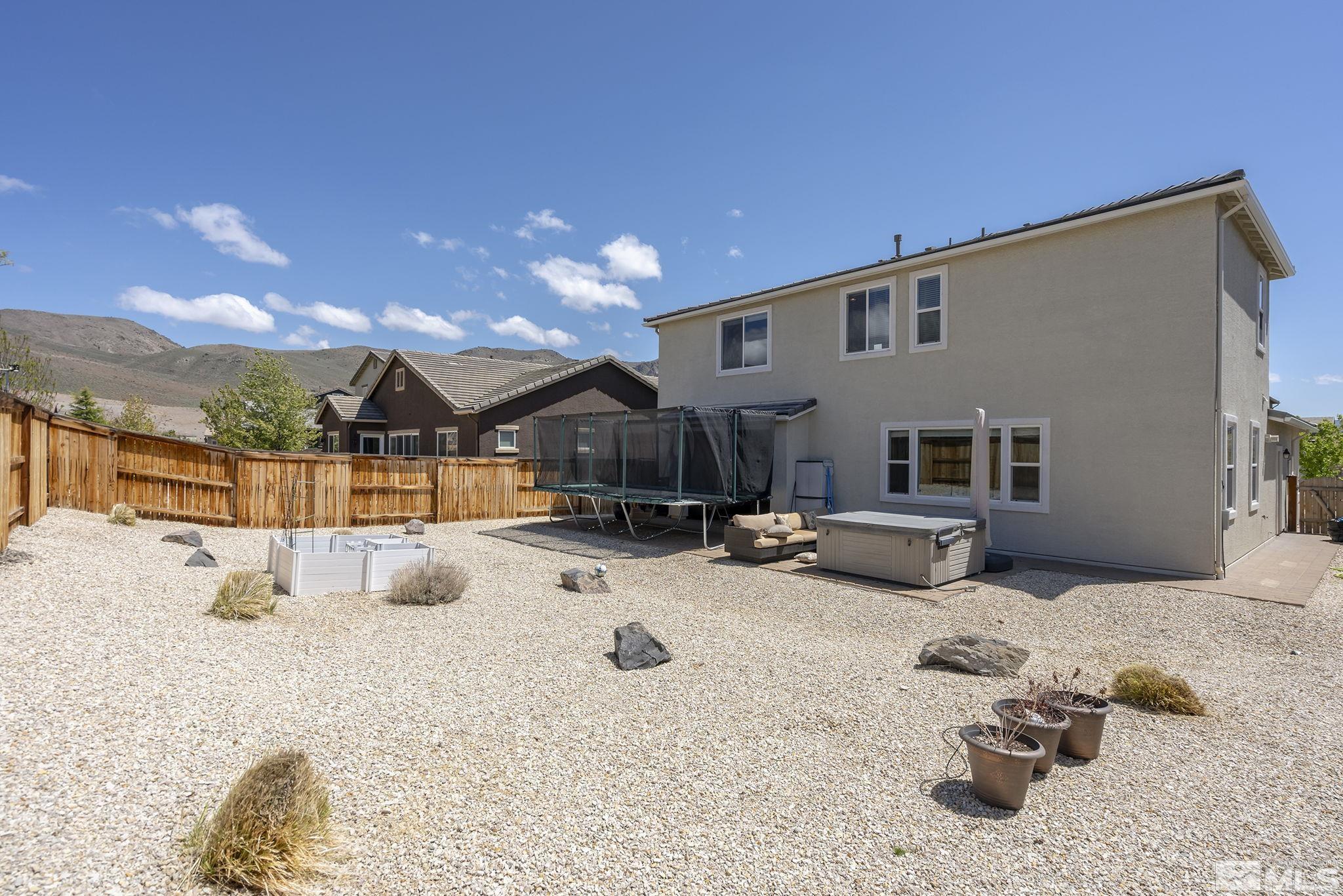 2835 Bonfire Lane Reno, NV 89521 - Photo 27 of 28 a view of a backyard of a house