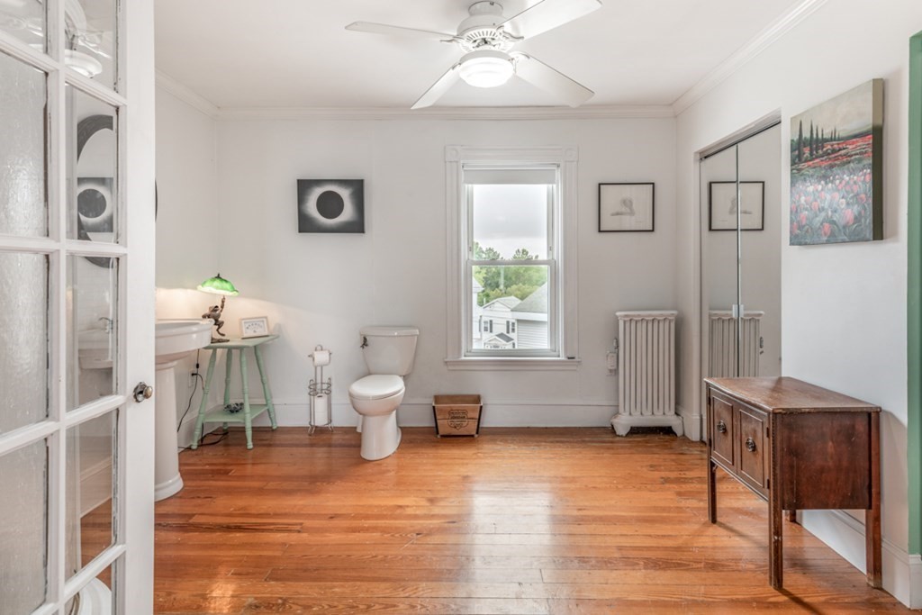 106 Upland Road Winthrop, MA 02152 - Photo 18 of 37 a living room with furniture and a window