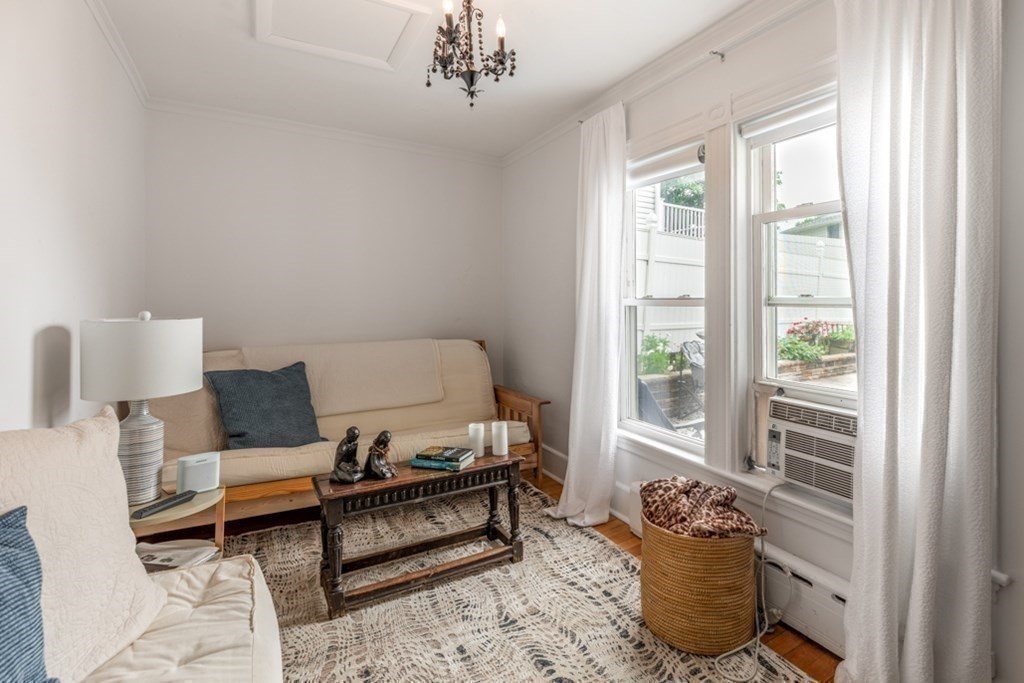 106 Upland Road Winthrop, MA 02152 - Photo 23 of 37 a living room with furniture and a window