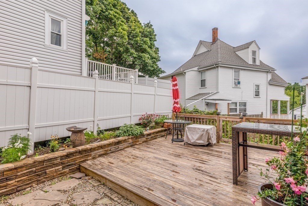 106 Upland Road Winthrop, MA 02152 - Photo 27 of 37 a front view of a house with garden