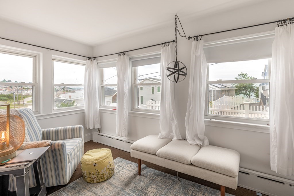 106 Upland Road Winthrop, MA 02152 - Photo 33 of 37 a living room with furniture and a window