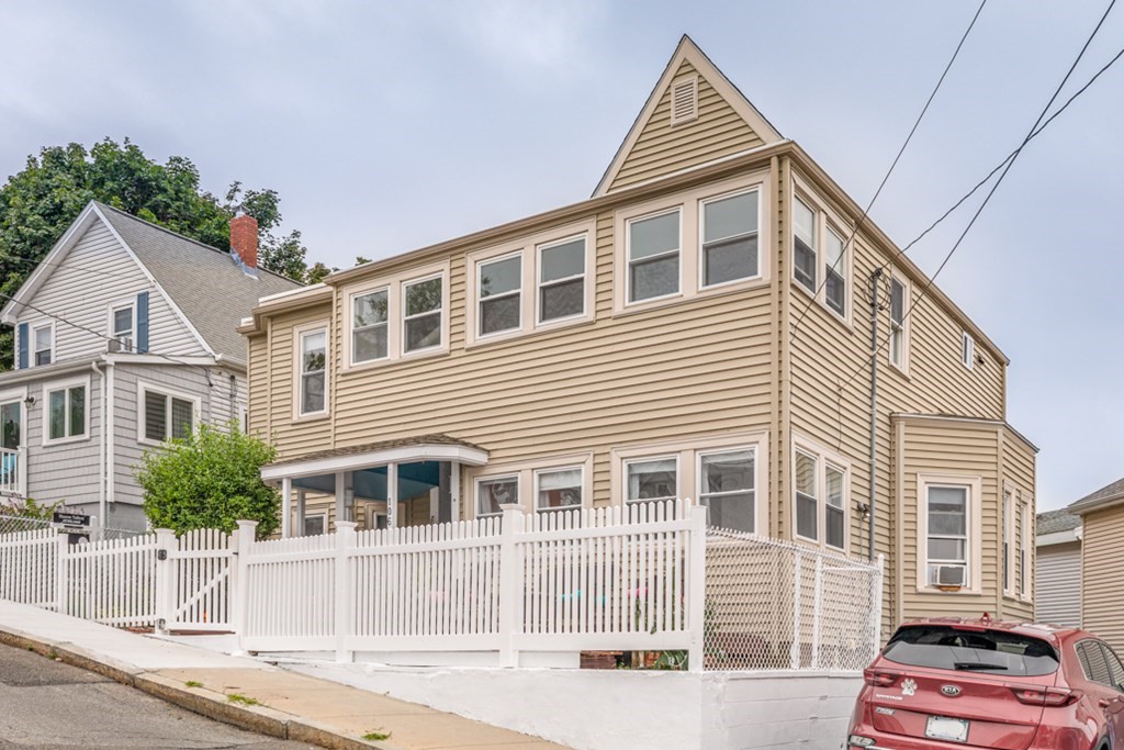 106 Upland Road Winthrop, MA 02152 - Photo 5 of 37 a view of a house with a yard
