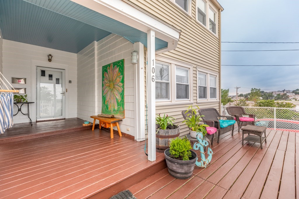 106 Upland Road Winthrop, MA 02152 - Photo 7 of 37 a living room filled with furniture