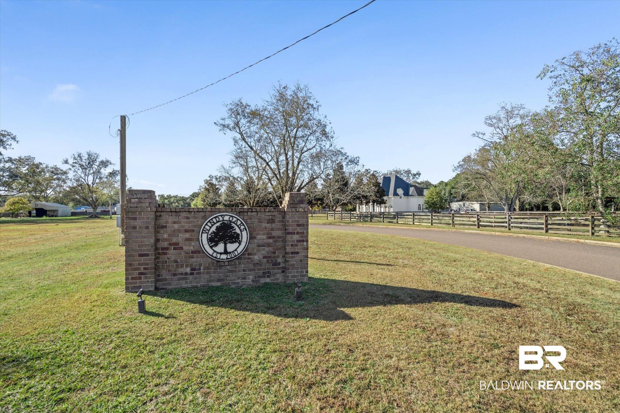 0 Acorn Way Grand Bay, AL 36541 - Photo 2 of 17 View of community / neighborhood sign