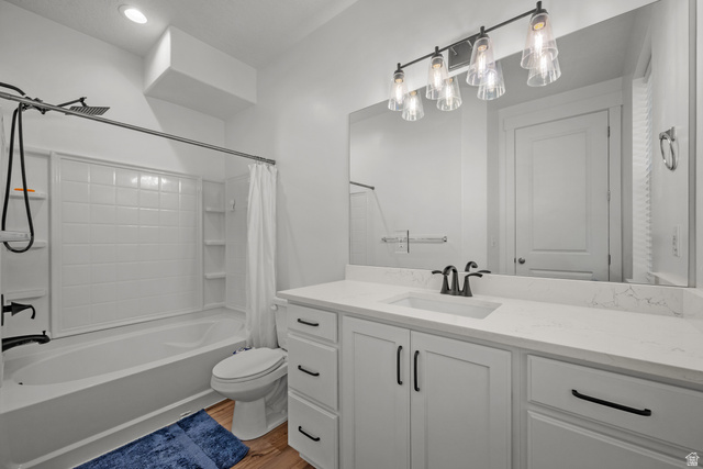 1693 North Center Point Lane Salem, UT 84653 - Photo 13 of 26 Bathroom featuring a white vanity with a light-colored countertop, an integrated sink with a dark-finished faucet, and a large wall-mounted mirror